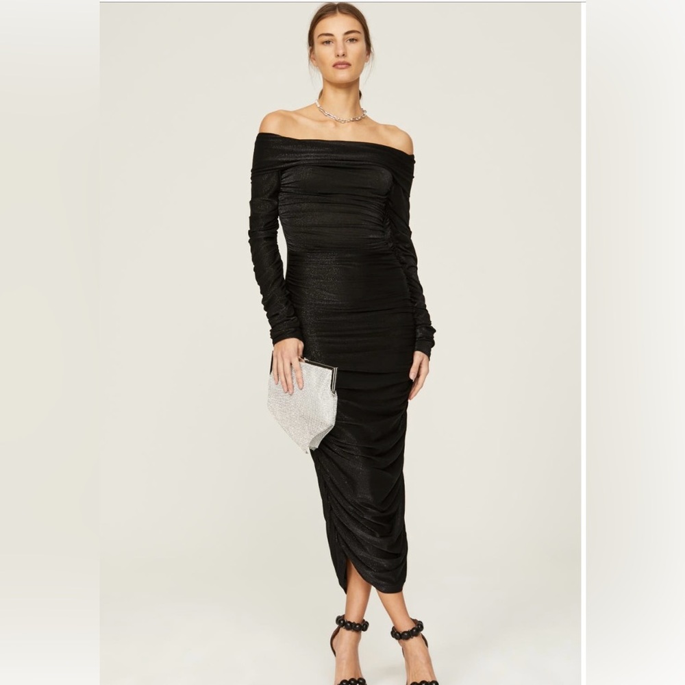 Bronx and Banco
Amara Midi Dress | $650 original retail